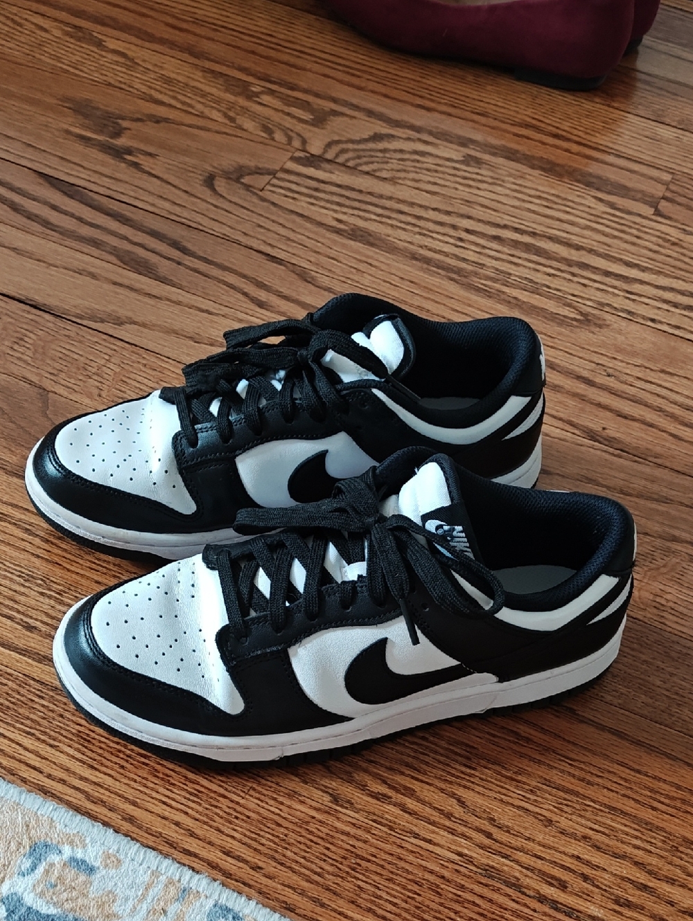 Nike Low-Top Swoosh Sneakers in Black and White